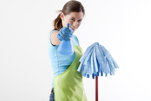 Professional after builders cleaning removing dust from a renovated room